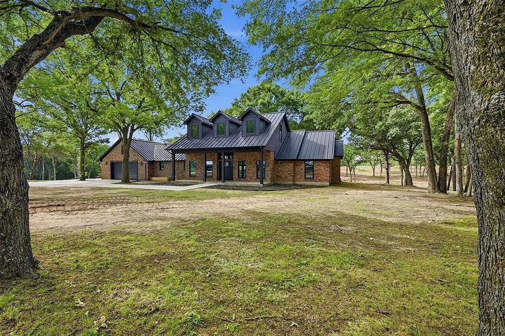 11 Acres of Land with Home for Sale in Sadler, Texas