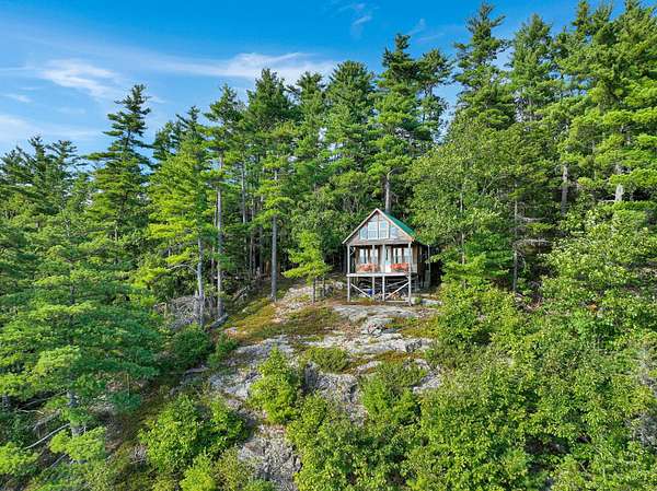 40 Acres of Recreational Land with Home for Sale in Mexico, Maine