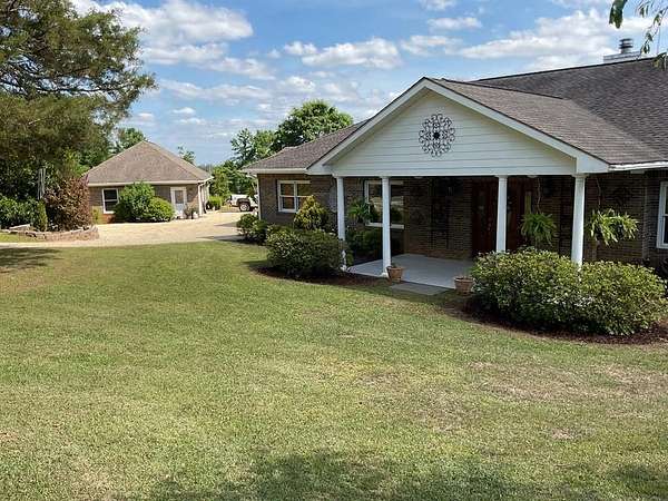 61 Acres of Land with Home for Sale in Goshen, Alabama