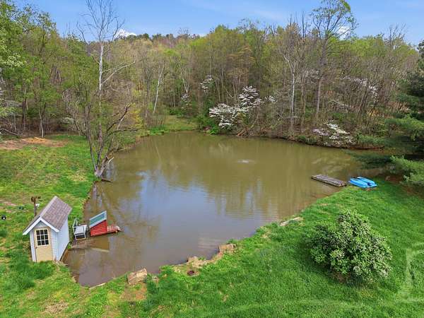 77.4 Acres of Land with Home for Auction in Quaker City, Ohio