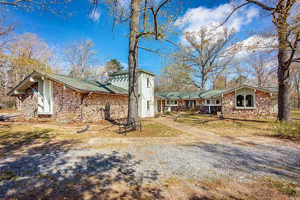 7.7 Acres of Land with Home for Sale in Redfield, Arkansas