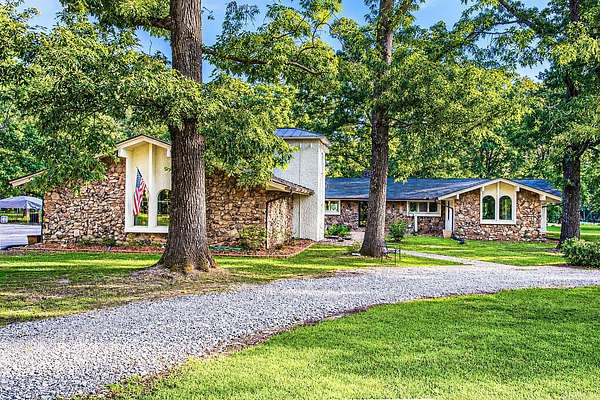 7.7 Acres of Land with Home for Sale in Redfield, Arkansas