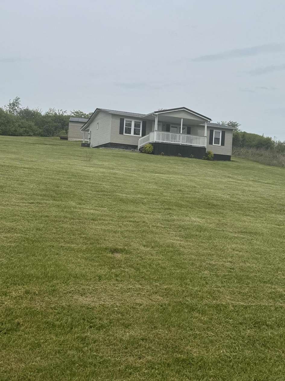 4 Acres of Land with Home for Sale in Carlisle, Kentucky