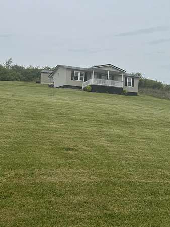 4 Acres of Land with Home for Sale in Carlisle, Kentucky