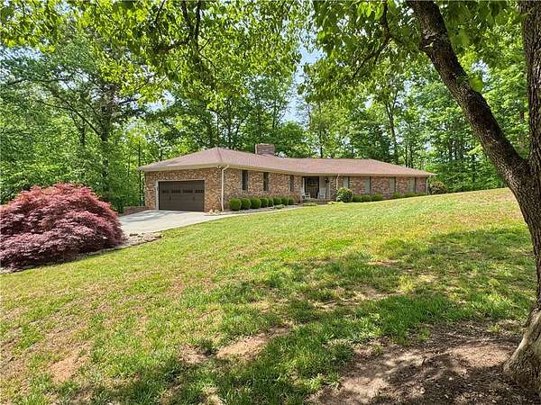 7.76 Acres of Land with Home for Sale in Pickens, South Carolina