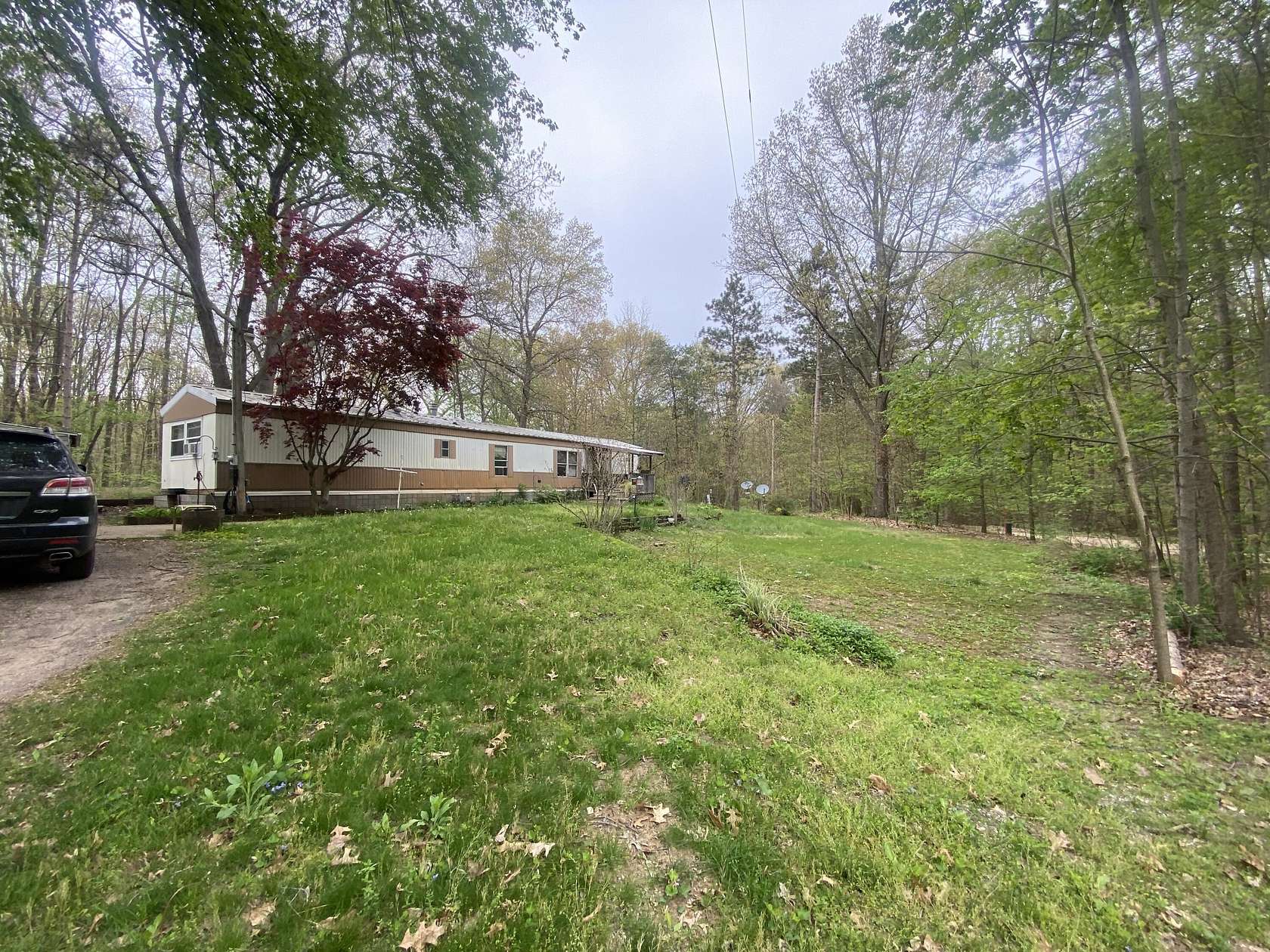 2 Acres of Land with Home for Sale in Dorr, Michigan