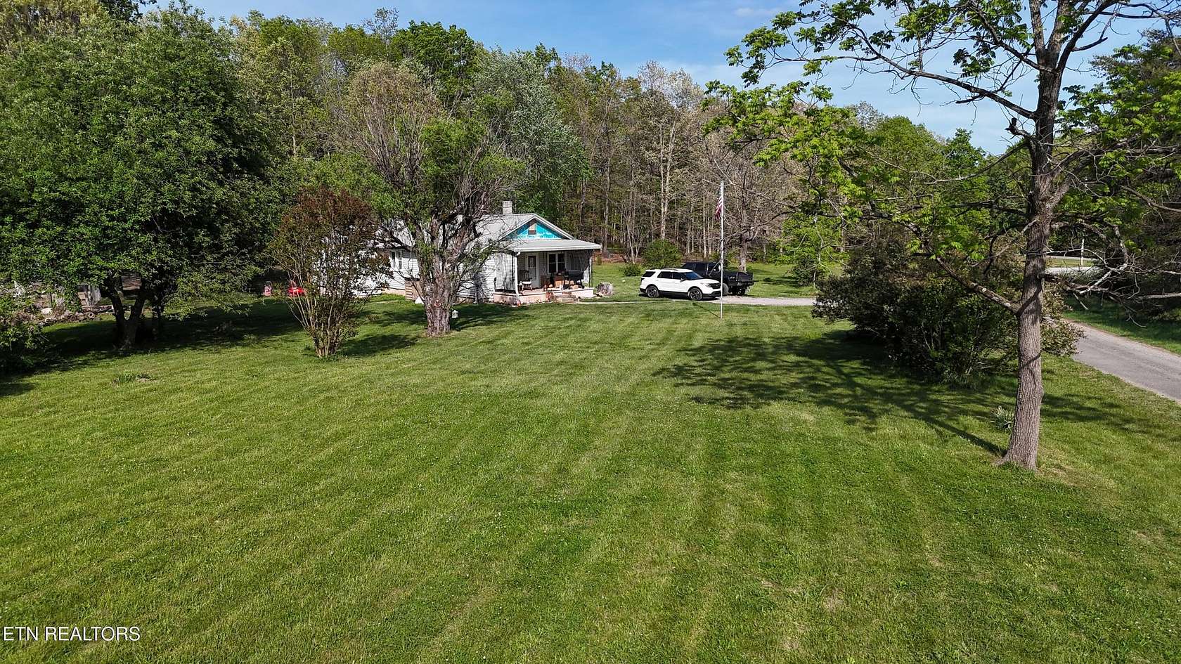 4 Acres of Land with Home for Auction in Monterey, Tennessee
