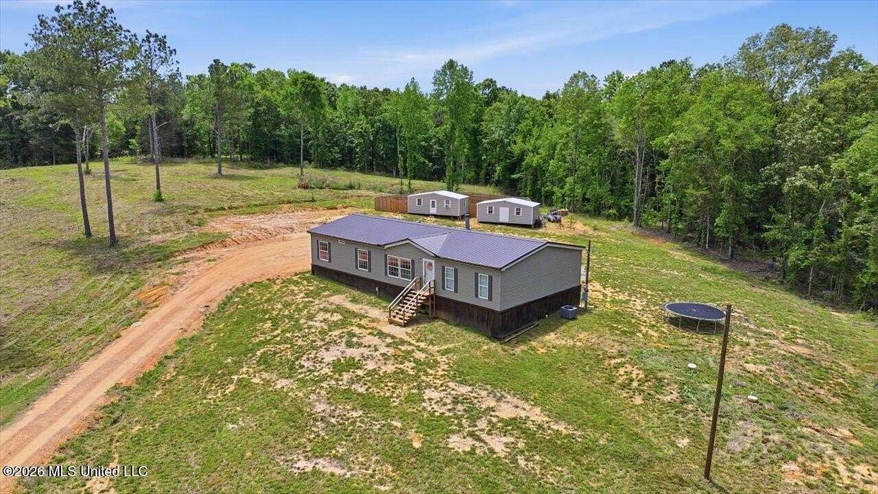 5 Acres of Land with Home for Sale in Florence, Mississippi
