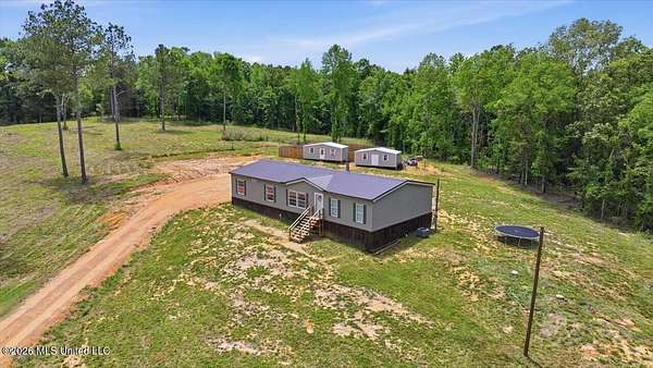 5 Acres of Land with Home for Sale in Florence, Mississippi