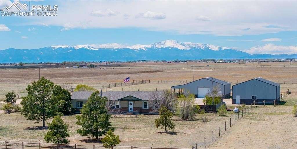 5 Acres of Land with Home for Sale in Peyton, Colorado