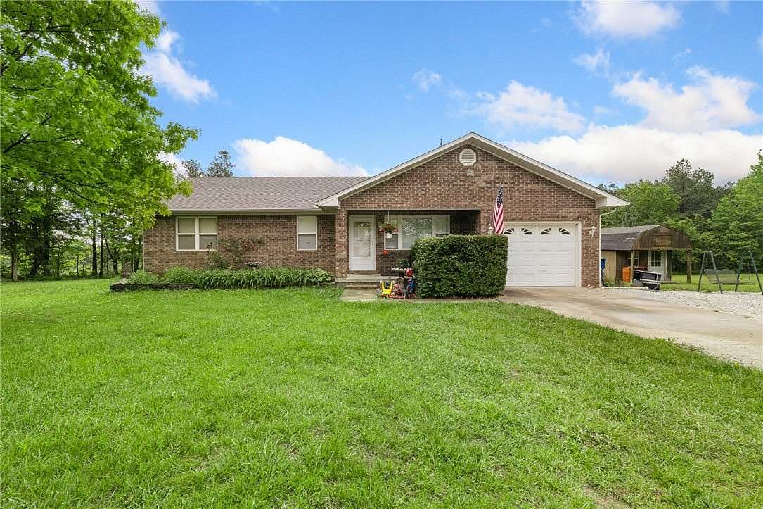 8.6 Acres of Land with Home for Sale in Harrison, Arkansas