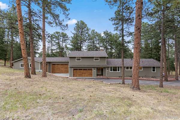 1.64 Acres of Land with Home for Sale in Indian Hills, Colorado