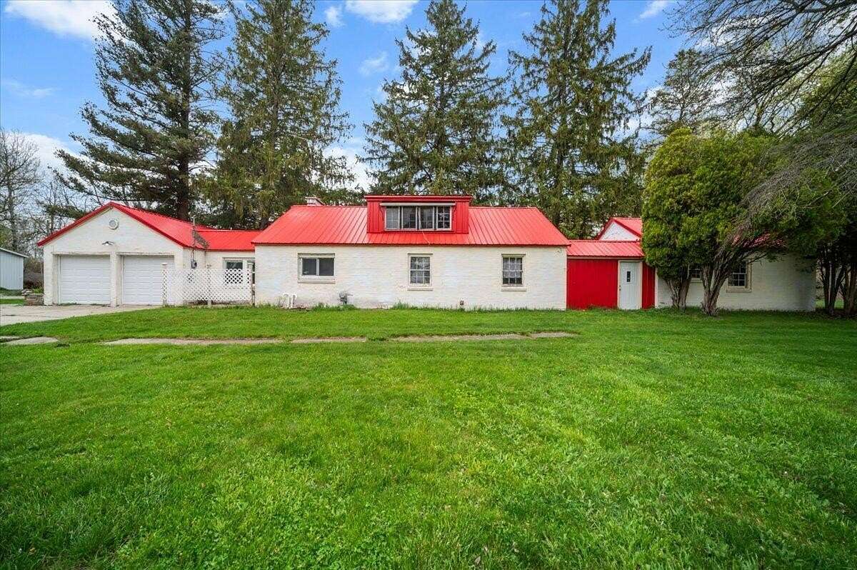 12 Acres of Recreational Land with Home for Sale in Vestaburg, Michigan