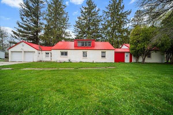 12 Acres of Recreational Land with Home for Sale in Vestaburg, Michigan