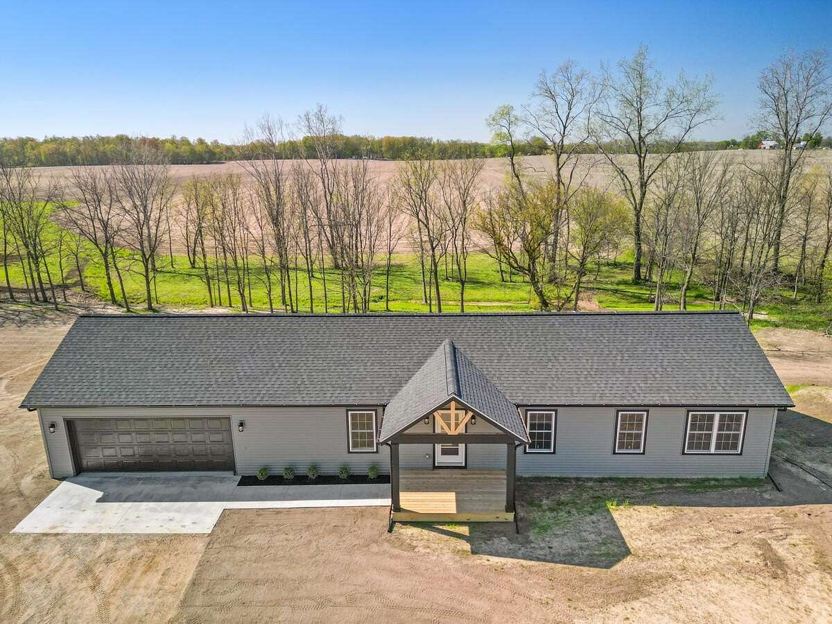 2.19 Acres of Land with Home for Sale in Grant, Michigan