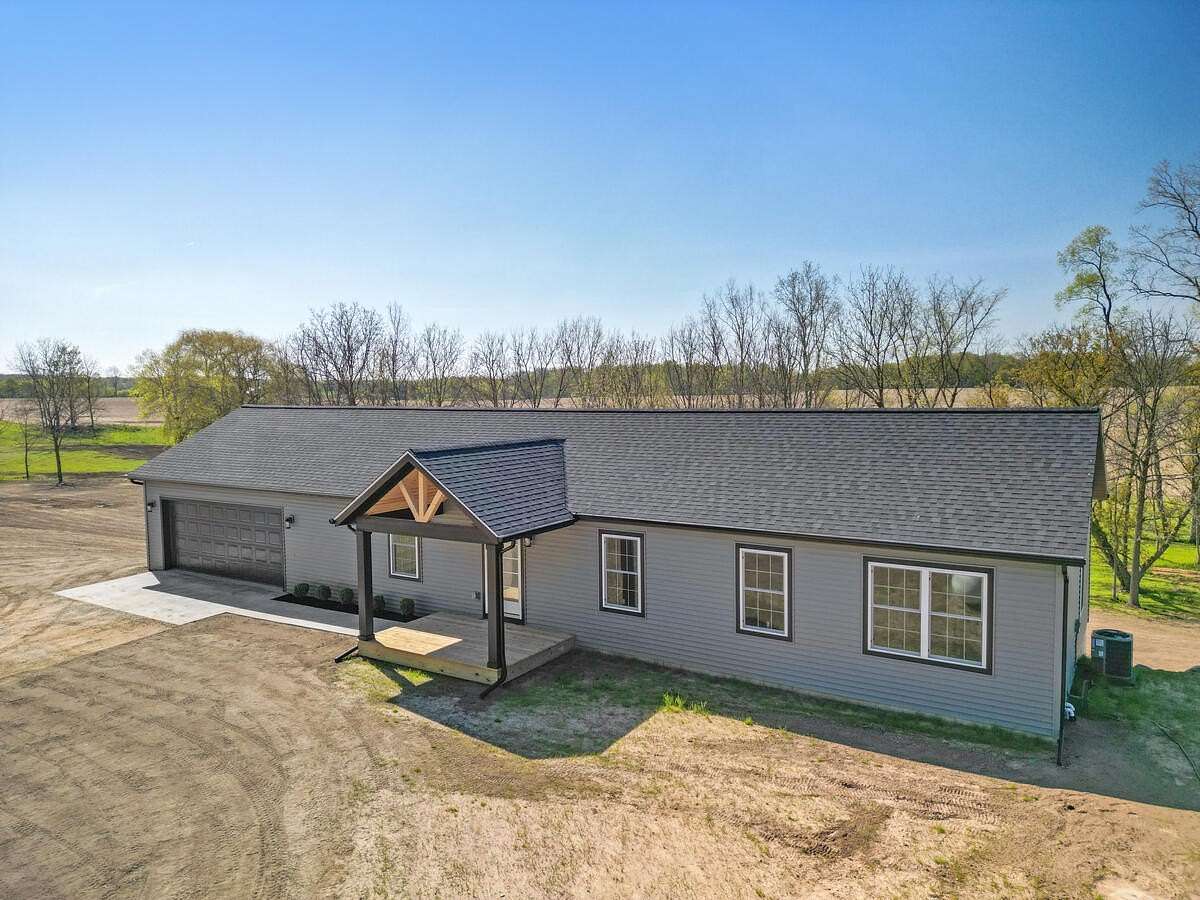 2.19 Acres of Land with Home for Sale in Grant, Michigan