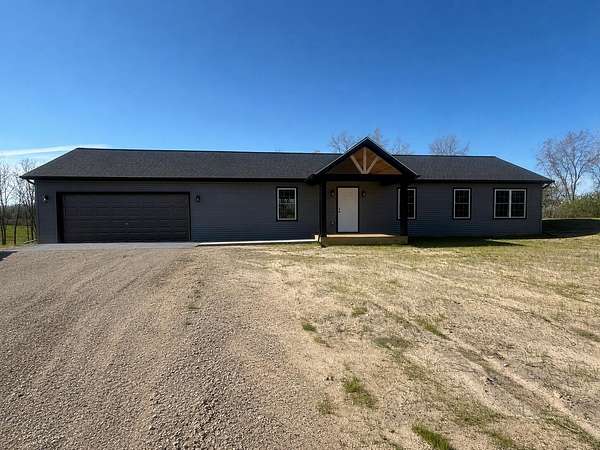 2.19 Acres of Land with Home for Sale in Grant, Michigan