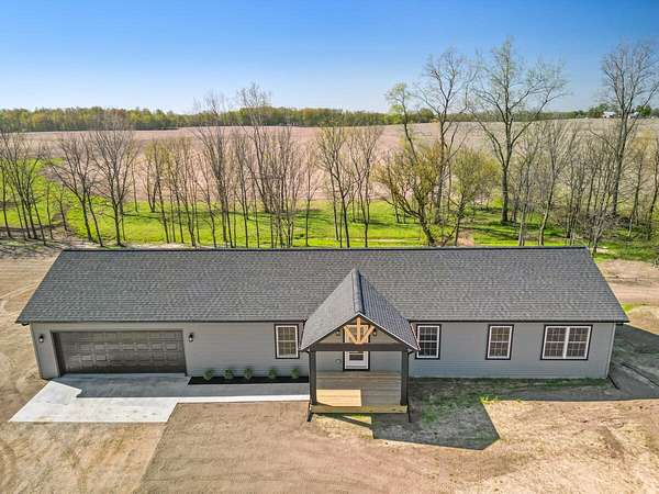 2.19 Acres of Land with Home for Sale in Grant, Michigan