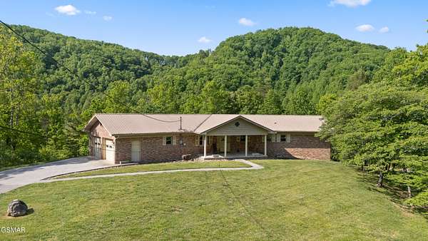 5.5 Acres of Land with Home for Sale in Sevierville, Tennessee