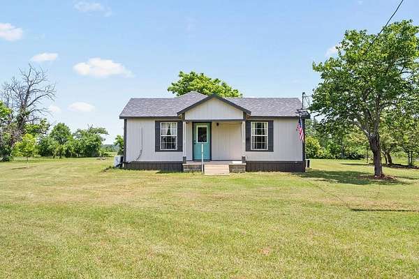 3.48 Acres of Land with Home for Sale in Avinger, Texas
