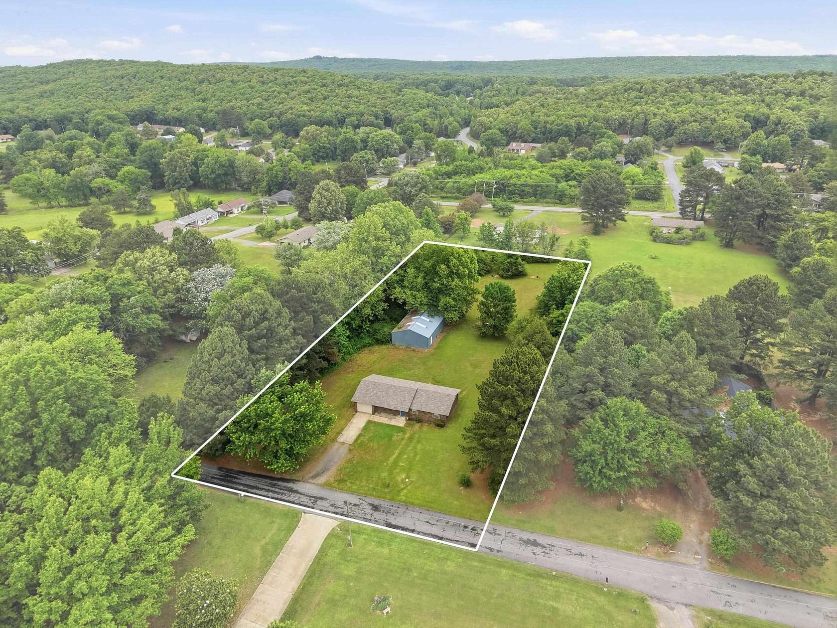 1.5 Acres of Land with Home for Sale in Conway, Arkansas