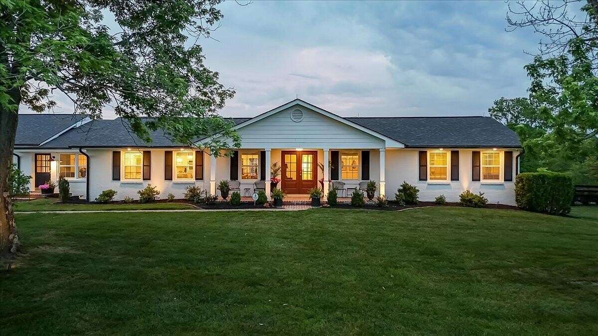 9.3 Acres of Land with Home for Sale in Versailles, Kentucky