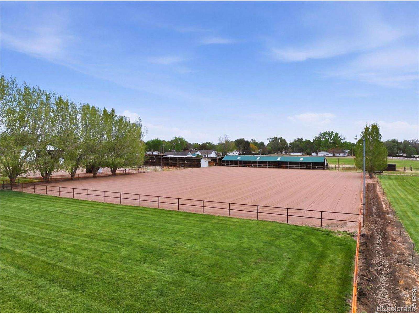 21.6 Acres of Agricultural Land with Home for Sale in Evans, Colorado