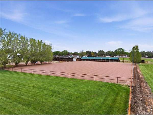21.6 Acres of Agricultural Land with Home for Sale in Evans, Colorado