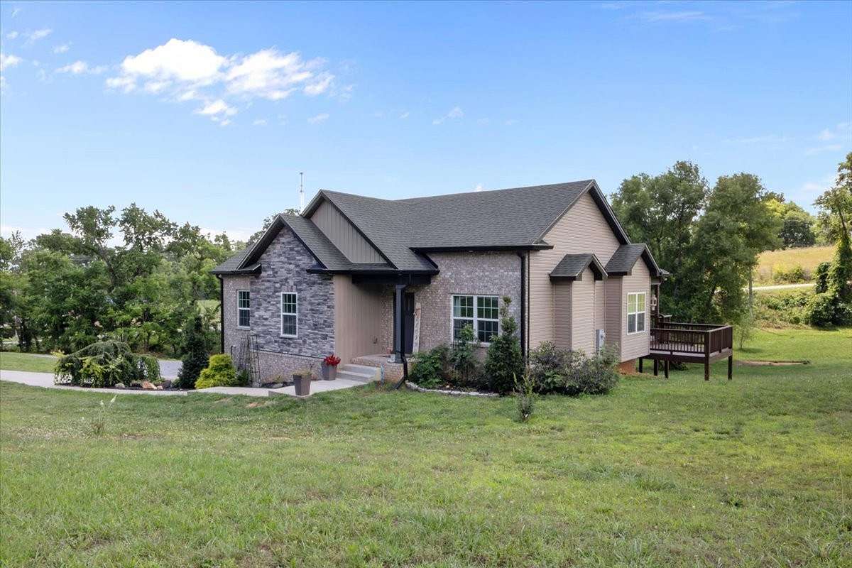 1.64 Acres of Land with Home for Sale in Cunningham, Tennessee