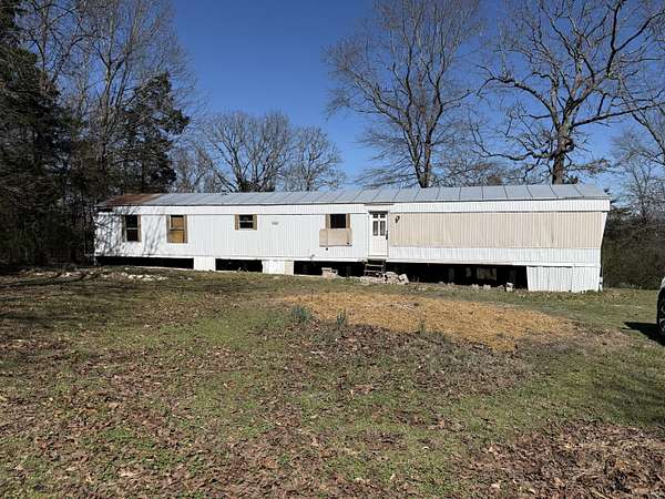 1.87 Acres of Land with Home for Sale in Kirbyville, Missouri