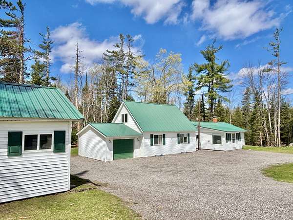 6 Acres of Land with Home for Sale in Fairview, Michigan