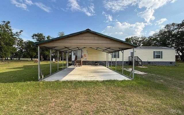 7.33 Acres of Land with Home for Sale in Fort White, Florida