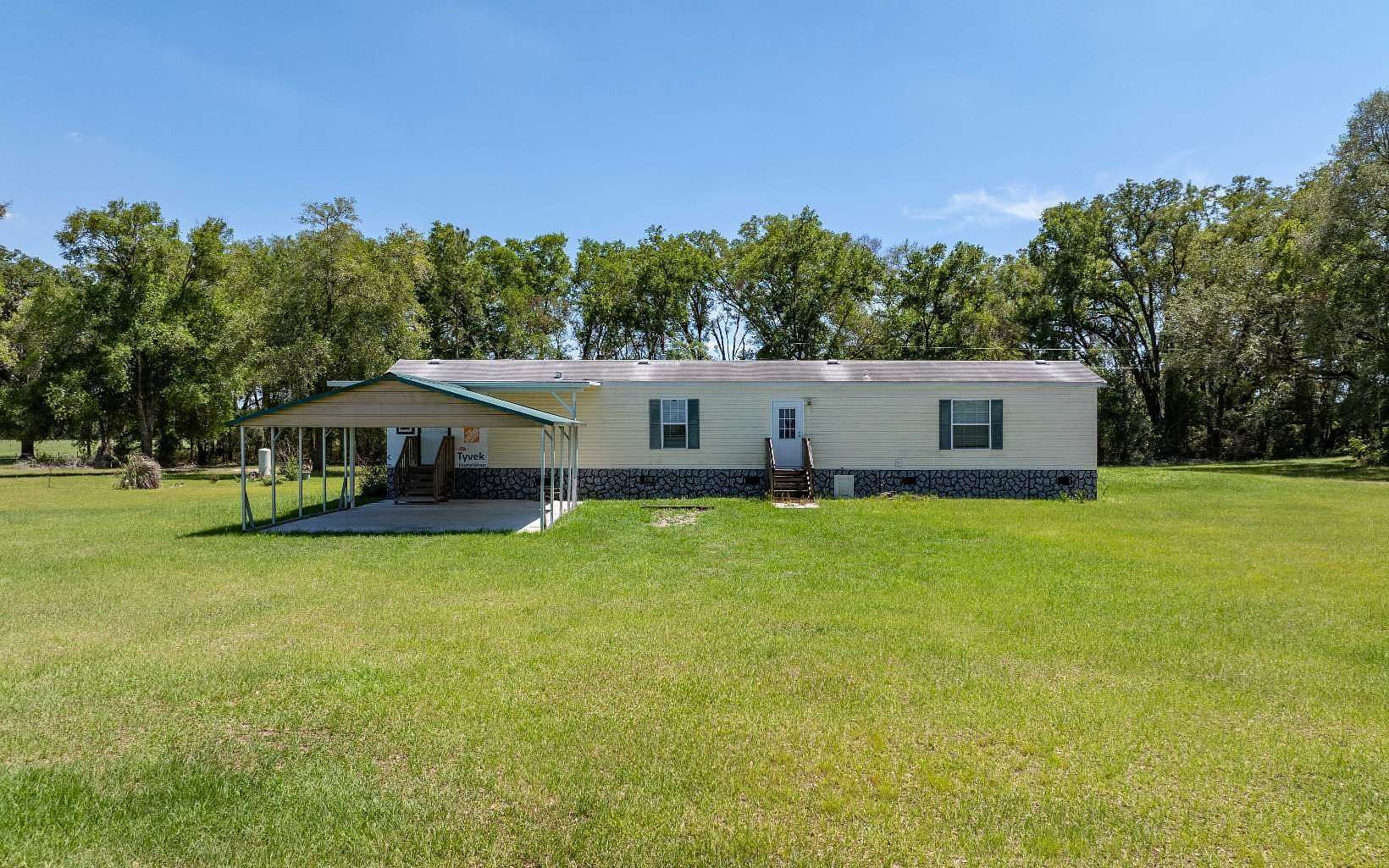 7.33 Acres of Land with Home for Sale in Fort White, Florida