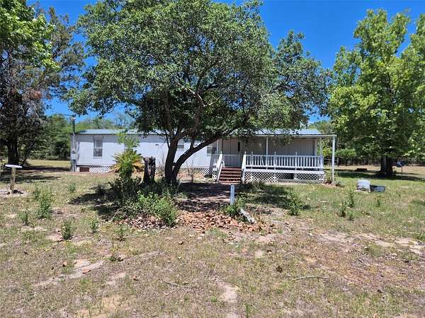 4.75 Acres of Land with Home for Sale in Bronson, Florida
