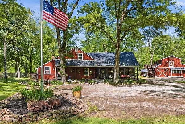 4.7 Acres of Land with Home for Sale in Peculiar, Missouri