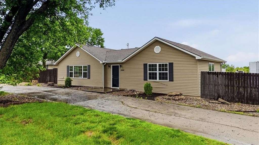 0.78 Acres of Land with Home for Auction in Lee's Summit, Missouri