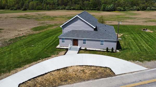 5.89 Acres of Land with Home for Sale in Ashley, Ohio