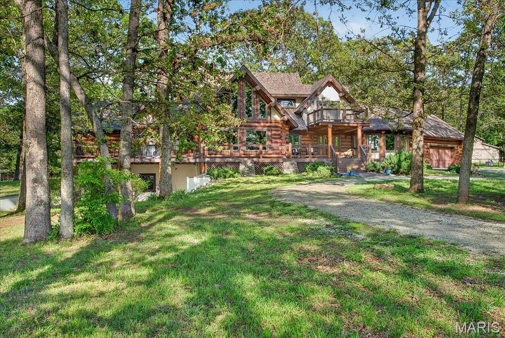 31.2 Acres of Land with Home for Sale in Farmington, Missouri