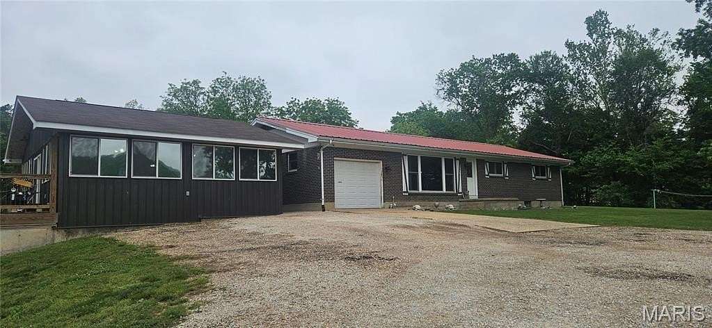 5.4 Acres of Land with Home for Sale in Centerville, Missouri