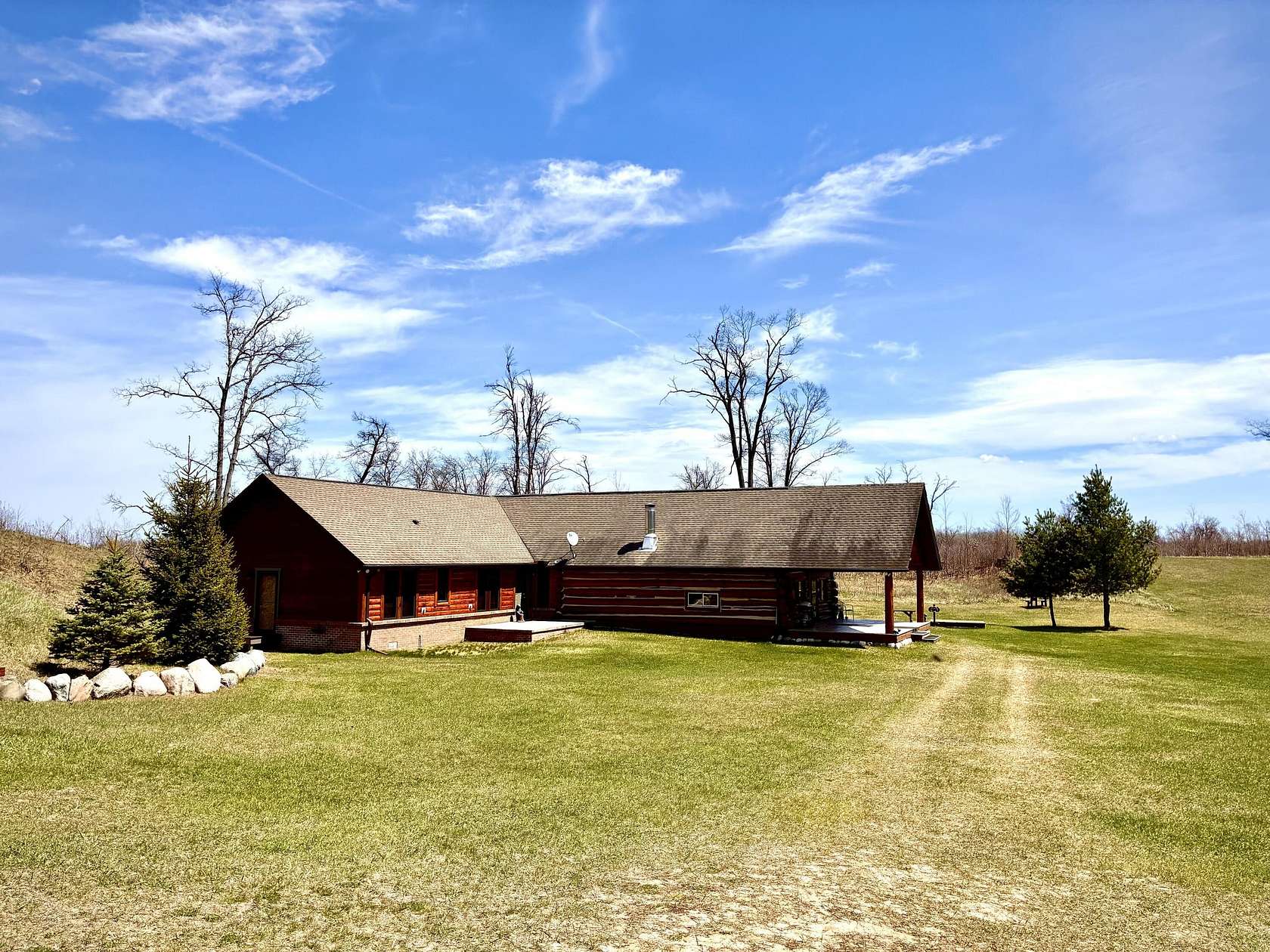 80 Acres of Recreational Land with Home for Sale in Comins, Michigan
