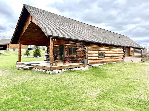 80 Acres of Recreational Land with Home for Sale in Comins, Michigan