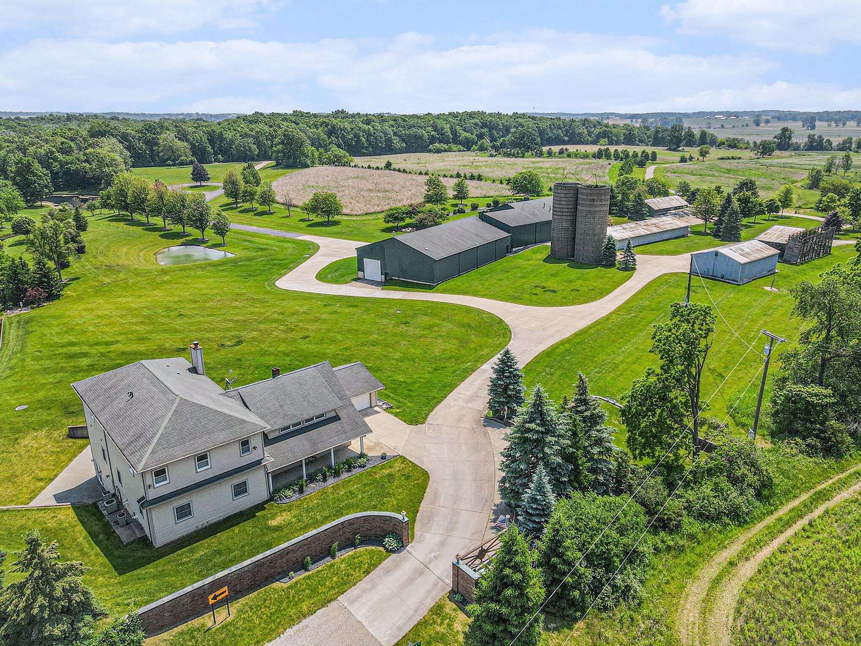 261 Acres of Agricultural Land with Home for Sale in Saline, Michigan