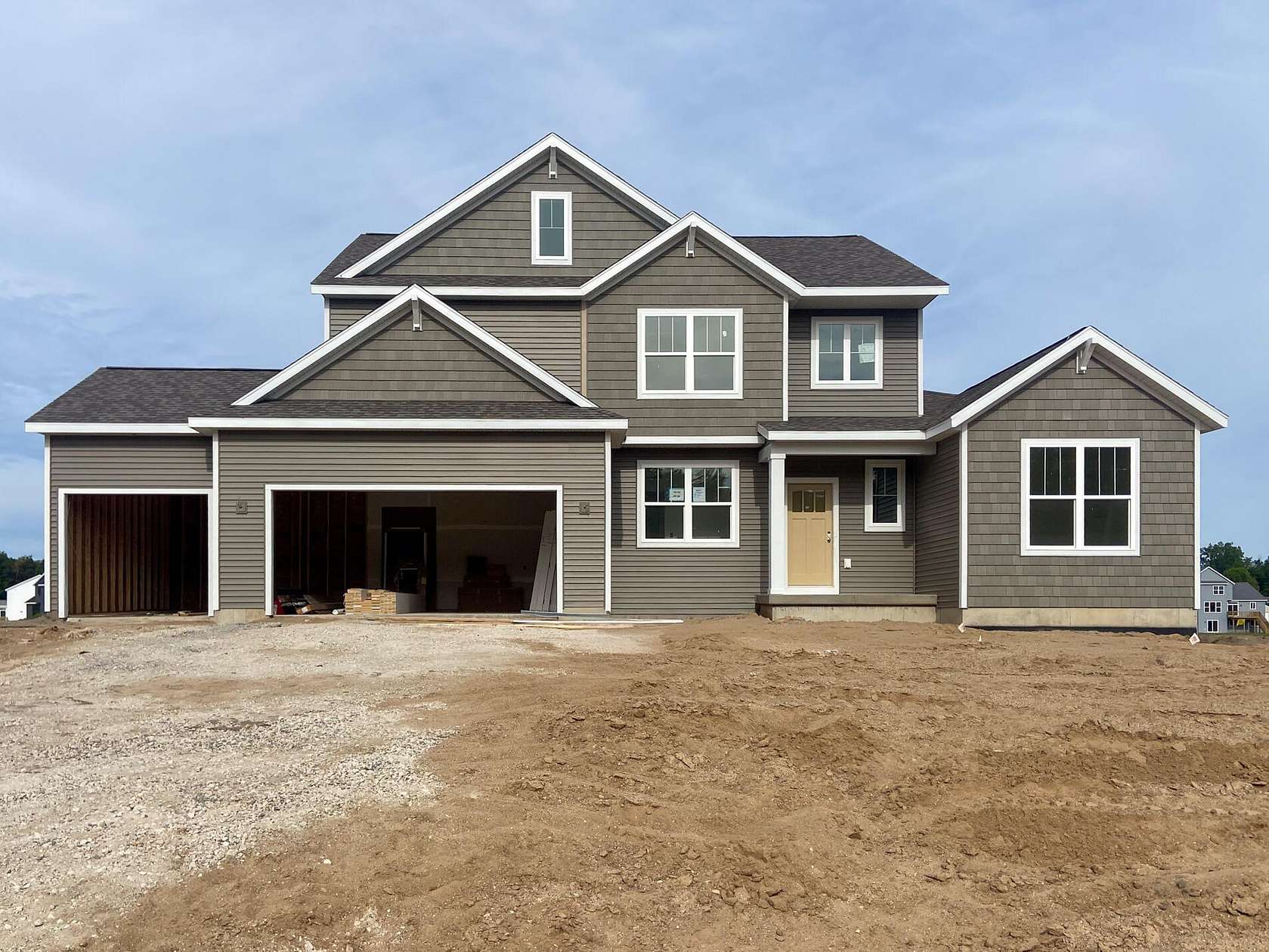 2 Acres of Land with Home for Sale in Allendale, Michigan