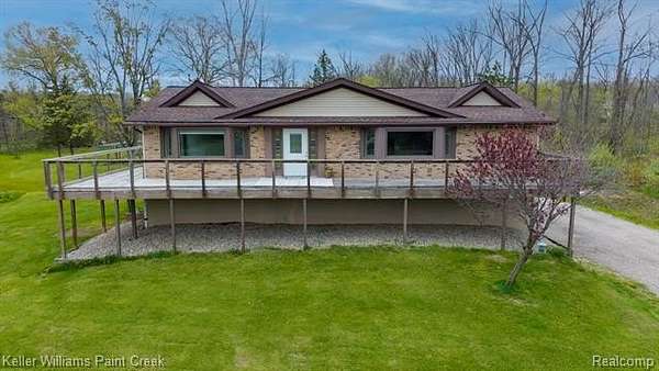 3.1 Acres of Land with Home for Sale in Addison Township, Michigan