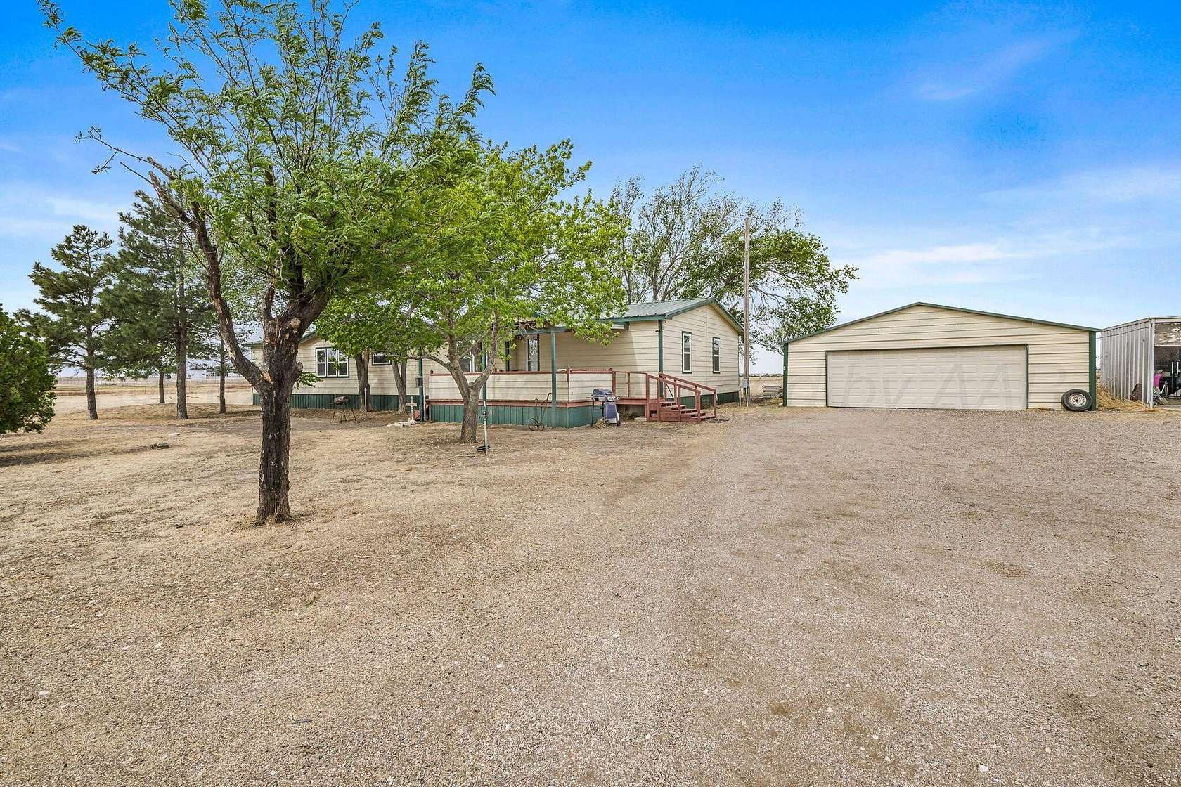 10 Acres of Land with Home for Sale in Canyon, Texas