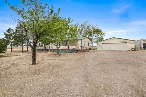 10 Acres of Land with Home for Sale in Canyon, Texas