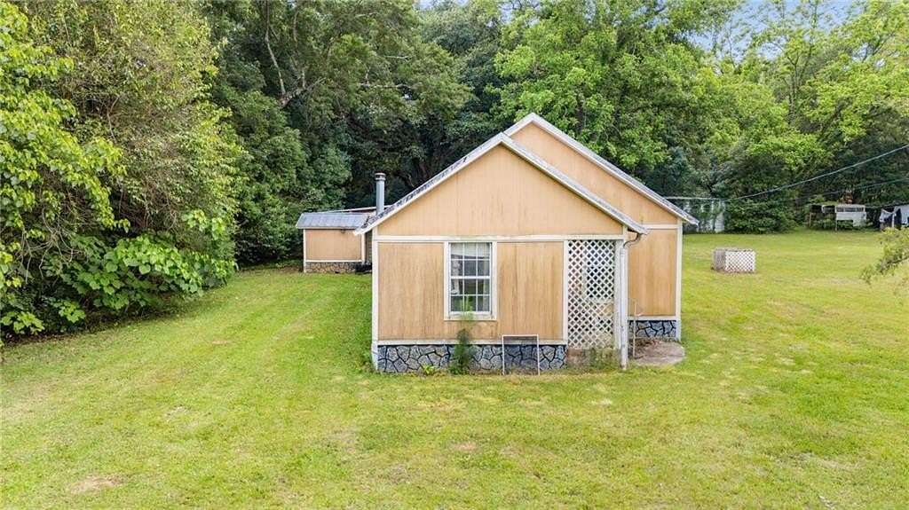 3.9 Acres of Land with Home for Sale in Robertsdale, Alabama