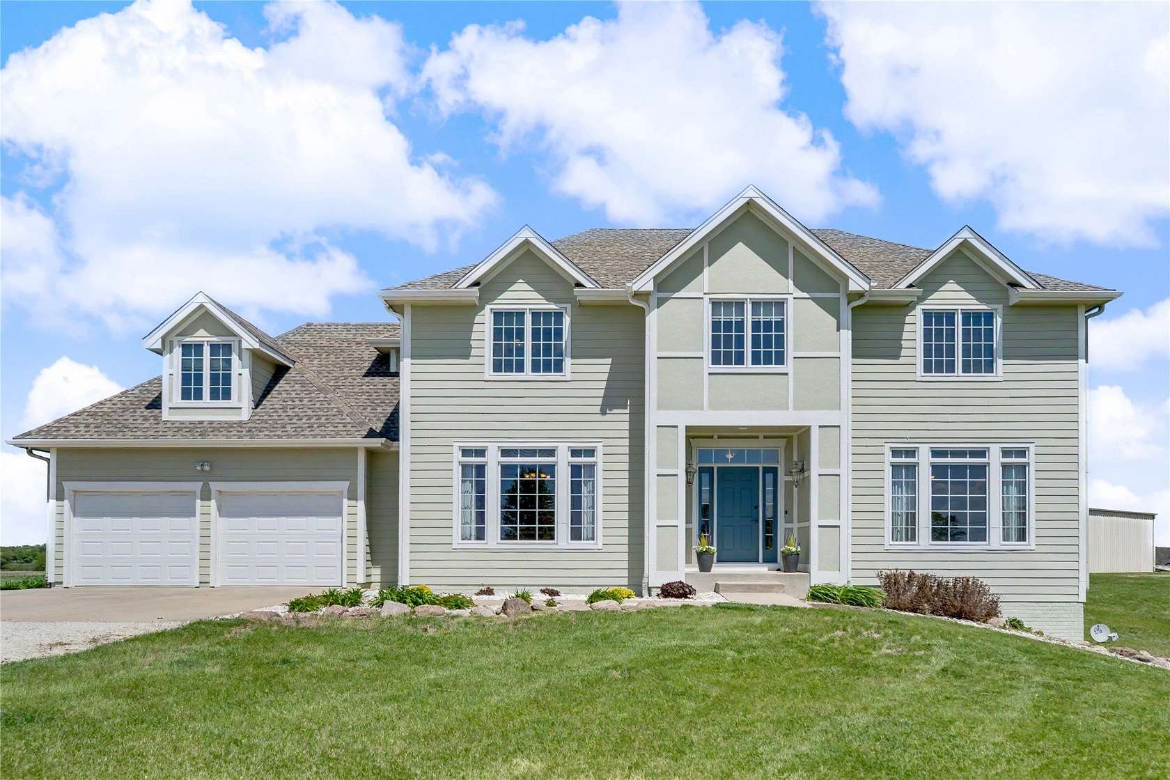 5 Acres of Land with Home for Sale in Dallas Center, Iowa