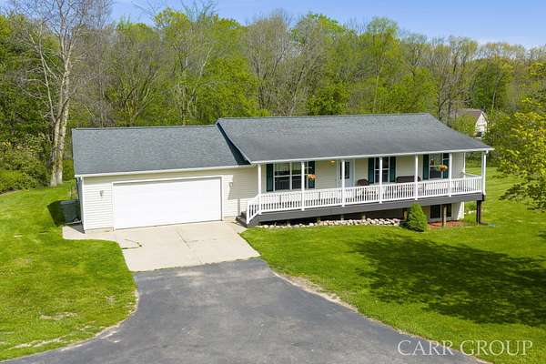 2.5 Acres of Land with Home for Sale in Dorr, Michigan