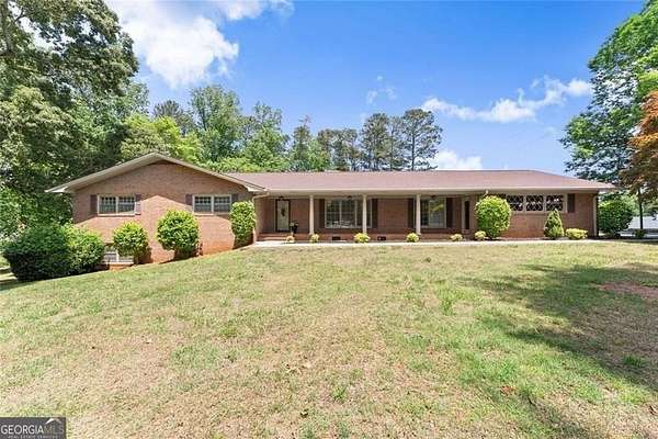 4 Acres of Land with Home for Sale in Oakwood, Georgia